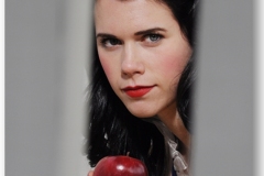 woman dressed as snow white handing you an apple