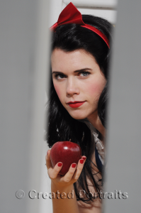 Beautiful woman holding an apple.